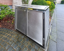 Edelstahl-Mülltonnenverkleidung im Stil des Eingangsgeländers in Essen